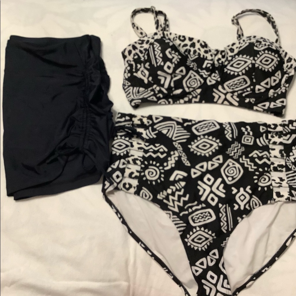 Super cute bathing suit with skirt cover up.